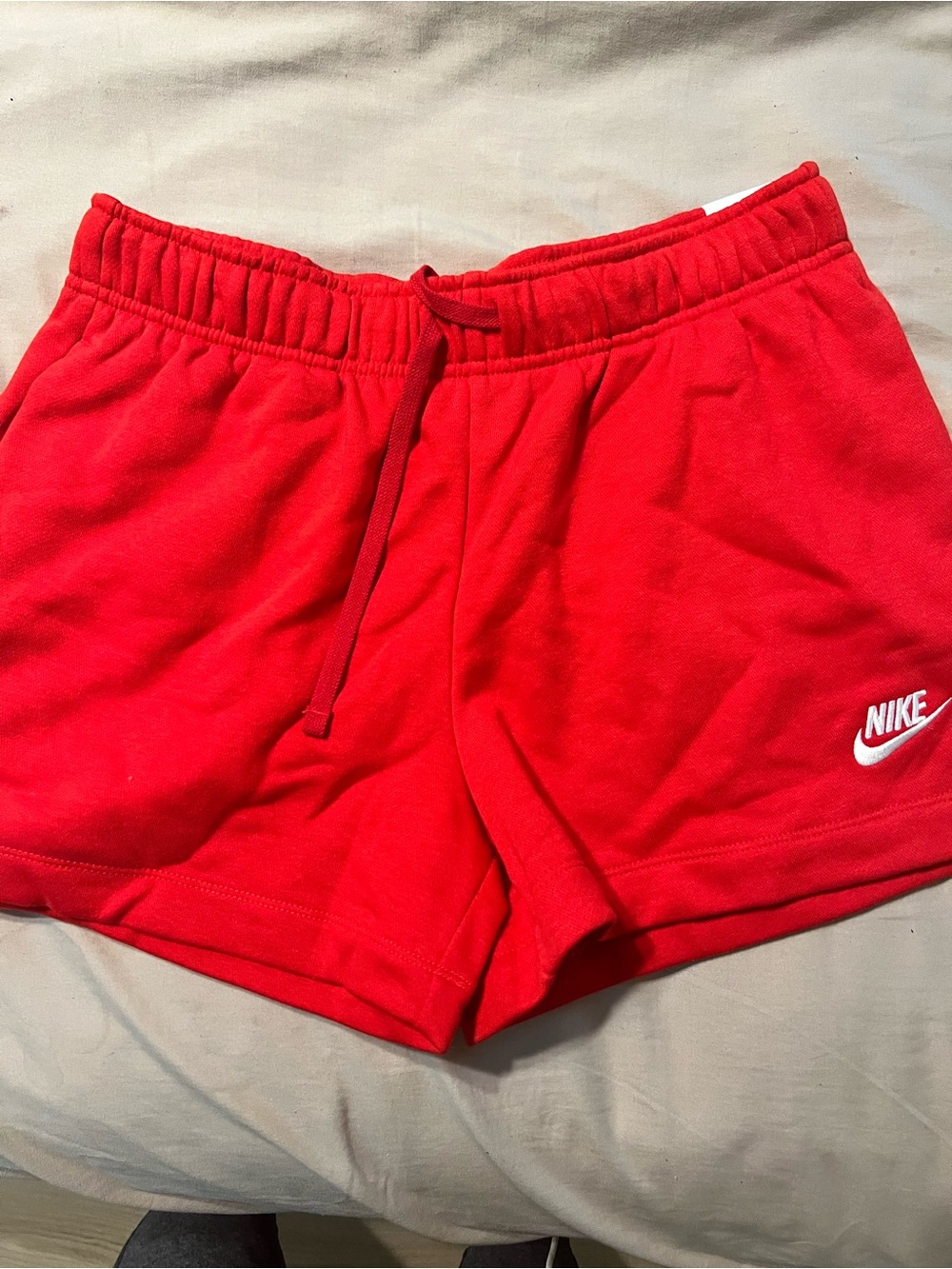 Nike Women’s Red Athletic Shorts with White Logo